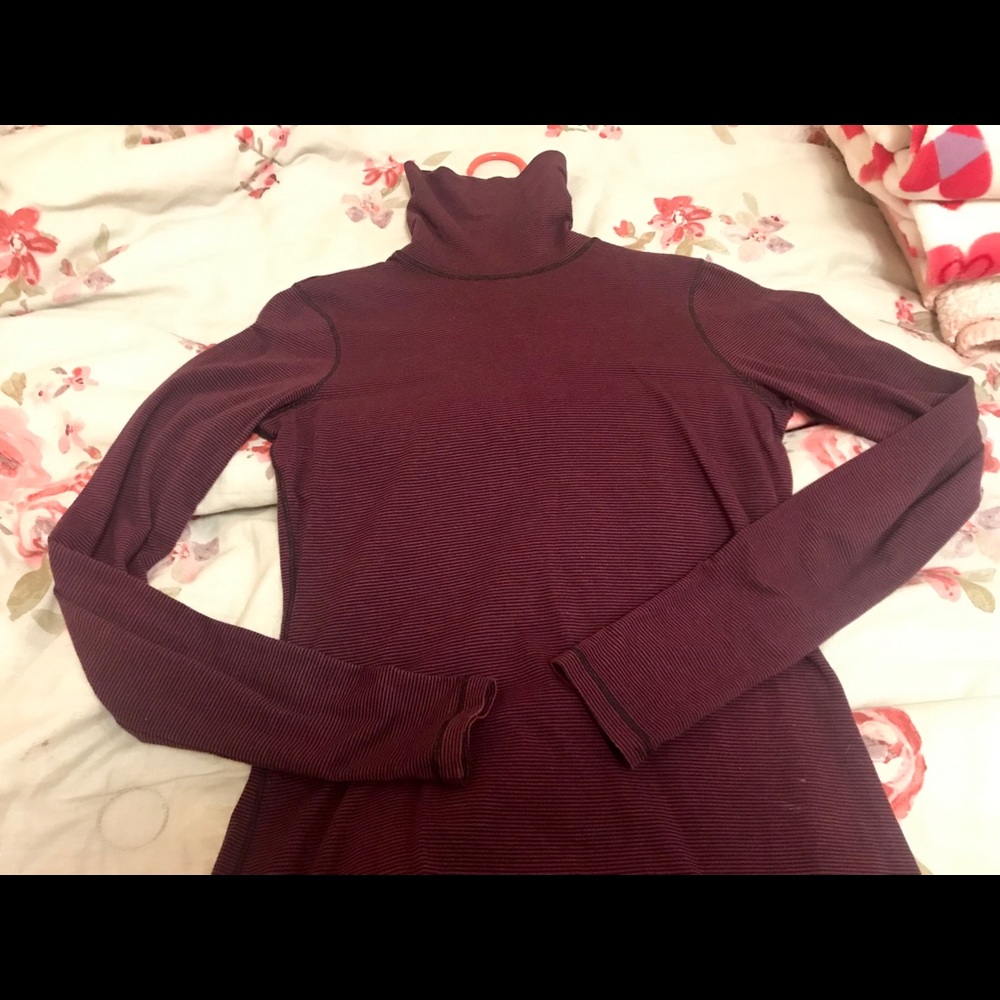 Purple and black striped turtleneck